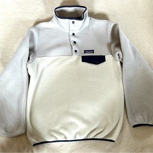 Patagonia pullover fleece. Snap closure front - 4 buttons. Cream & light gray.